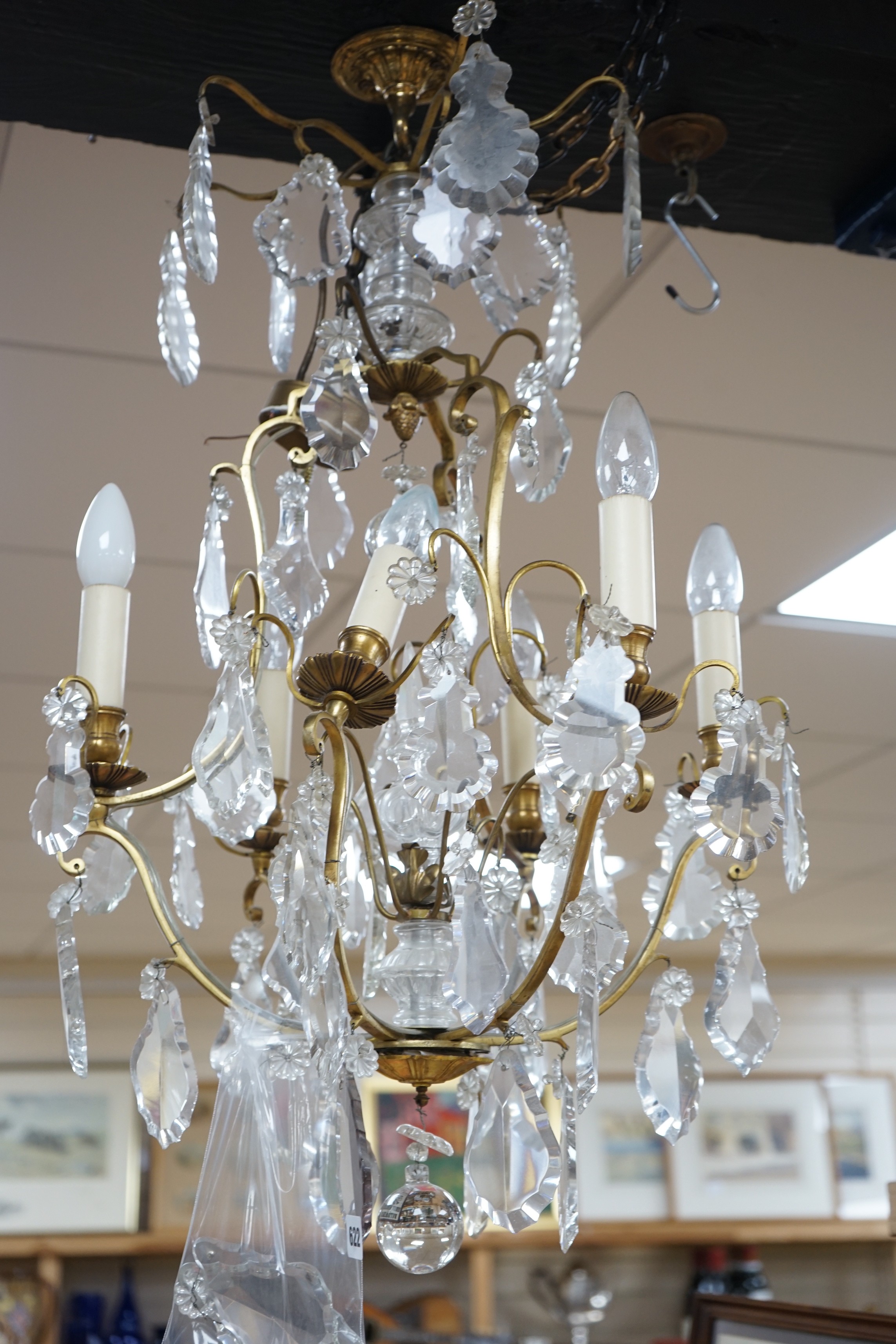A late 19th/early 20th century French ormolu and lustre hung chandelier, drop approximately 70cm